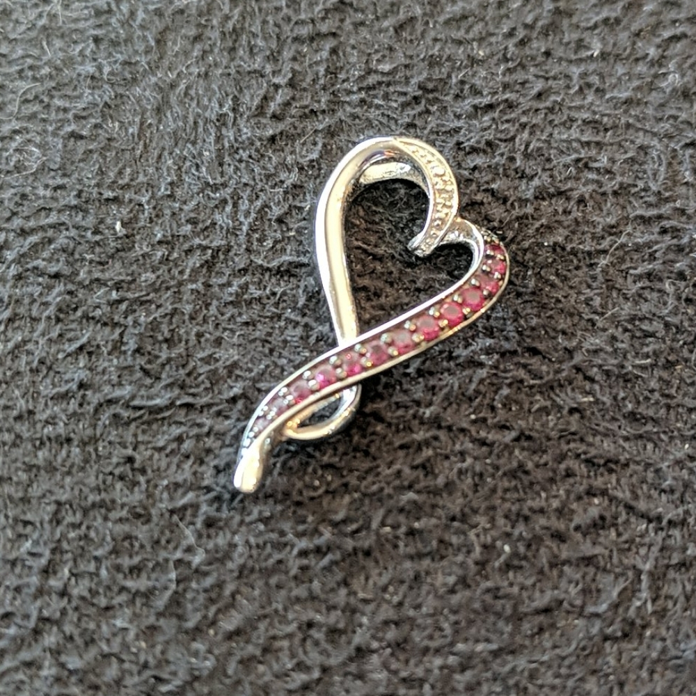 Sterling silver ruby and diamond heart pendant